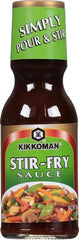 Stir-frying meat with Kikkoman Sauce for savory flavor