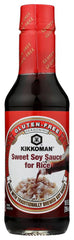 Kikkoman Sweet Soy Sauce bottle pouring over a dish, enhancing flavor with caramelized notes.