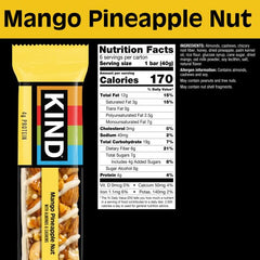 Close-up of KIND Mango Pineapple Nut bar showing real fruit and nuts.