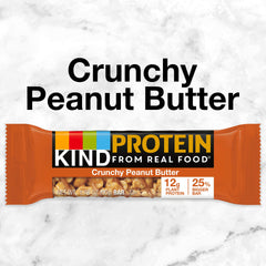 KIND PROTEIN Crunchy Peanut Butter bar in hand shows portable energy