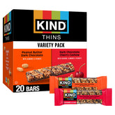 KIND Thins Dark Chocolate Cherry Cashew close-up, glossy drizzle, on-the-go snacking.