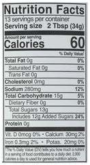 KINDER'S Organic Mild BBQ Sauce bottle glaze on grilled meat