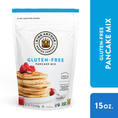 Fluffy King Arthur pancakes stacked high with gluten-free batter.