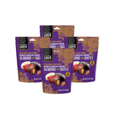 Kitchen & Love dark chocolate almond-stuffed dates on a plate, rich and on-the-go friendly.
