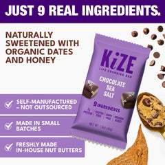 KiZE Energy Bar Chocolate Sea Salt bar held in hand for a convenient snack on busy days.