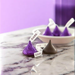 KLUB BULK Halloween and Easter display-ready kisses in purple foil.