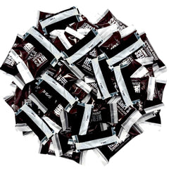 KLUB BULK mini sugar-free chocolate bars stacked for quick, on-the-go indulgence.