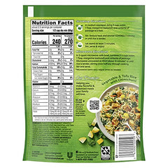 Close-up of peas and carrots in Knorr Rice Sides Medley for a vibrant side.