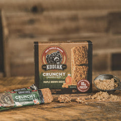 Kodiak Cakes crunchy granola bars box with six pouches demonstrates easy portioning for trails.
