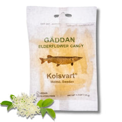 Kolsvart torsken-shaped Swedish candy—playful summer snack for sharing