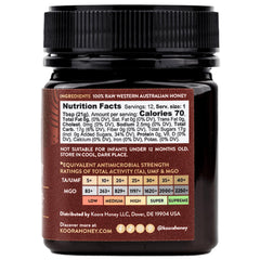 KOORA Marri Honey TA 25+ amber jar on a wooden surface signaling raw WA-origin purity.