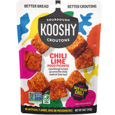 Kooshy Croutons Poco Picante bag shown as pantry staple for zesty salads.