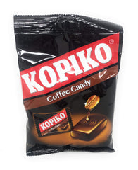 Kopiko coffee candy held in hand, ready for a quick pick-me-up.