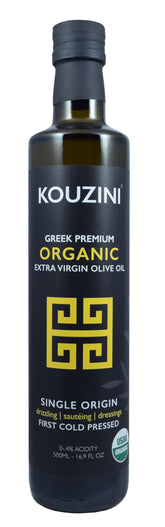 Kouzini olive oil bottle on kitchen counter, premium single-origin Greek EVOO for cooking.