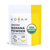 KOYAH Organic Banana Powder bottle on a kitchen counter for smoothies.