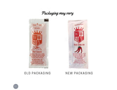 KPAK hot sauce packets served with dumplings for quick flavor.