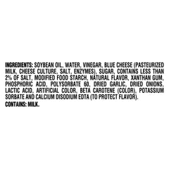 Pour shot of Kraft Roka Blue Cheese Dressing showing thick, creamy texture.