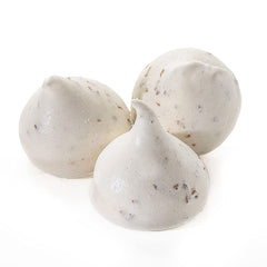 Close-up texture of Krunchy Melts meringue cookies, a fat-free option with a delicate crunch.