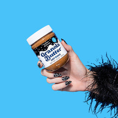 KWEEN granola butter dunked in milk evokes Oreo-inspired flavor
