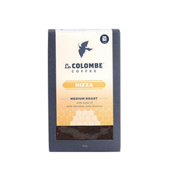 La Colombe Nizza packaging front highlighting sustainable sourcing and honey-sweet flavor.
