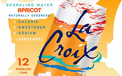 Close-up of La Croix Apricot label with natural essences.