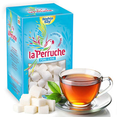 La Perruche sugar cubes dissolving in tea for subtle sweetness.