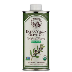 La Tourangelle Olive Oil Xvrgn Organic bottle on a kitchen counter for finishing.