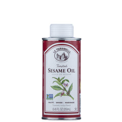 La Tourangelle Toasted Sesame Oil bottle pouring, ideal for quick stir-fries and flavorful marinades.