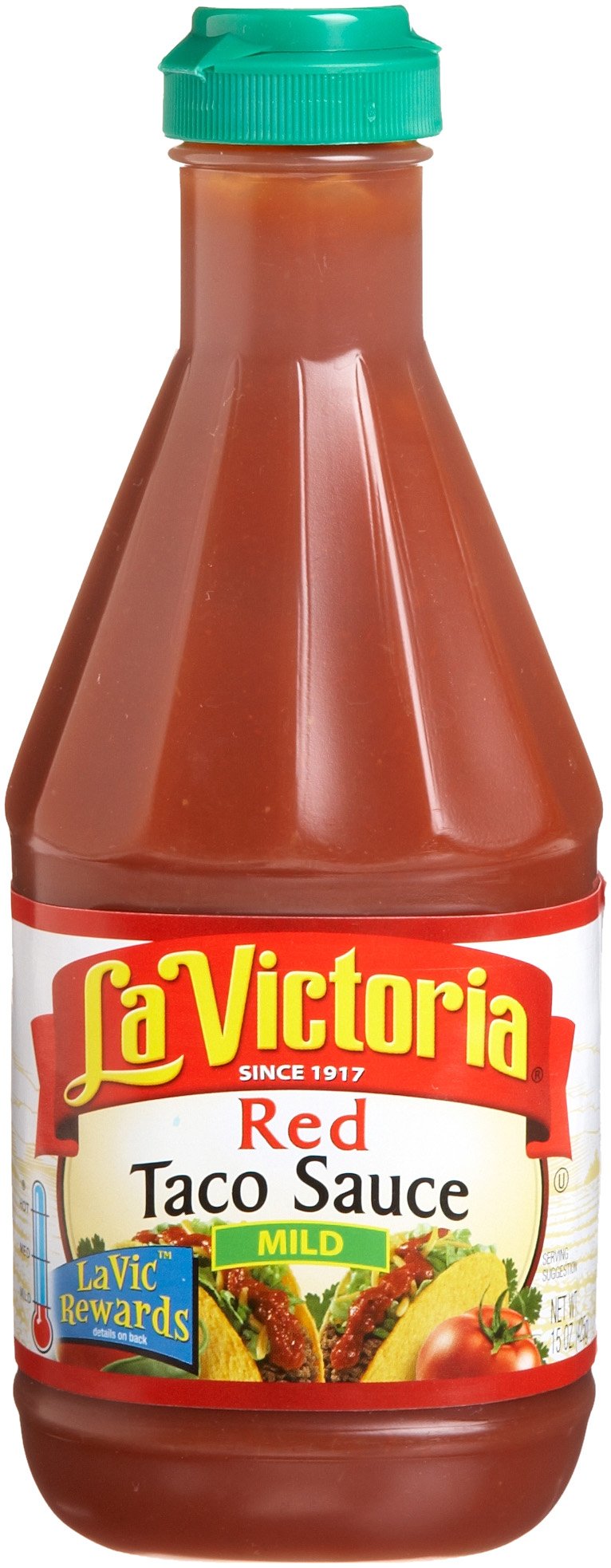 La Victoria Red Taco Sauce Mild bottle on a kitchen counter for quick tacos.
