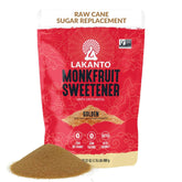 Lakanto Golden Monkfruit Sweetener bottle pouring caramel-like sweetness into coffee