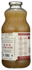 Lakewood Organic Pure Apple Juice being poured into a glass for a refreshing moment.