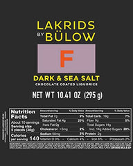 LAKRIDS BY BÜLOW dark sea salt bar cross-section reveals chocolate coating and salt.
