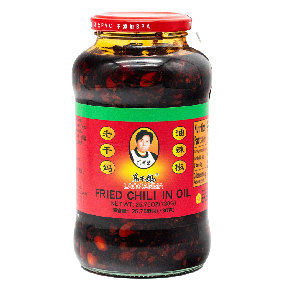 Lao Gan Ma Fried Chili in Oil bottle pour adds bold flavor to meals.