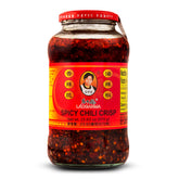 Lao Gan Ma Spicy Chili Crisp jar with crispy bits enhances stir-fries