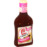 Lawry's Caribbean Jerk Marinade bottle pouring over chicken for bold island flavor.