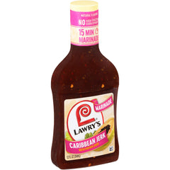 Lawry's Caribbean Jerk Marinade bottle pouring over chicken for bold island flavor.