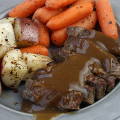 Beef marination bowl with Lawry's Tenderizing Beef Marinade for easy prep.