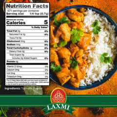Laxmi Turmeric Powder on a spoon shows convenient, ready-to-use spice