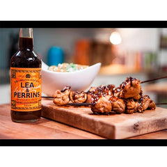 Lea & Perrins Worcestershire Sauce seasons a savory steak dish.