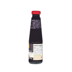 Lee Kum Kee Black Bean Sauce bottle pour over crispy vegetables for rich flavor.