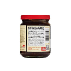 Pouring Lee Kum Kee Black Pepper Sauce adds restaurant-grade savor to stir-fries