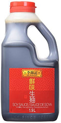 Lee Kum Kee soy sauce being poured over sizzling vegetables for depth of flavor.