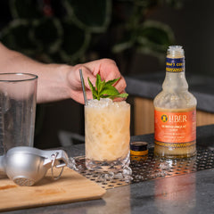 Liber & Co. Mai Tai ingredients laid out for premium tiki drink prep.