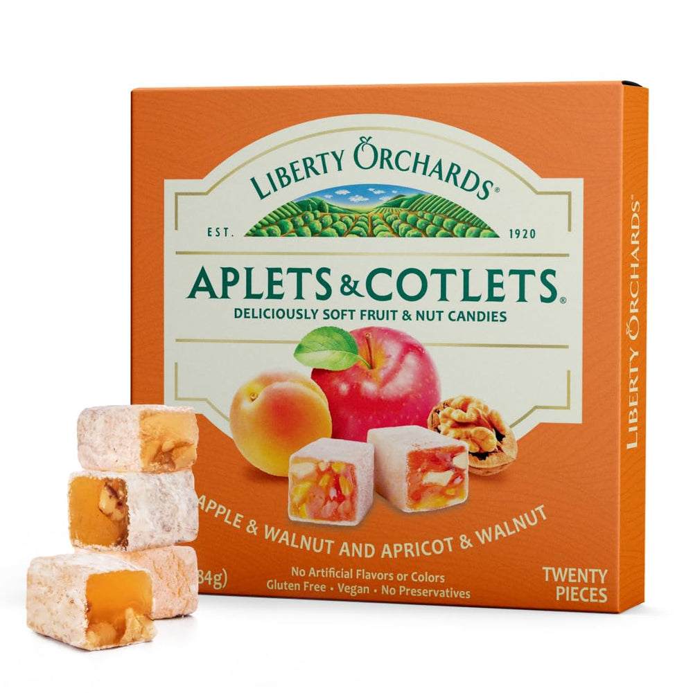 Liberty Orchards Aplets & Cotlets gift box open, inviting gourmet treat for celebrations.