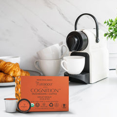 Lifeboost Cognition decaf mushroom pod in a Keurig slot for quick caffeine-free focus.