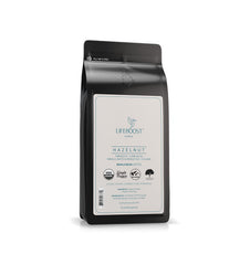 Lifeboost hazelnut whole bean 12oz bag showing balanced flavor for everyday brewing.