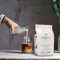 Lifeboost light roast ground coffee in a cup highlighting single-origin clarity.