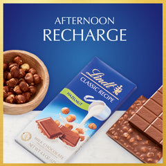 Close-up of Lindt hazelnut chunks in silky milk chocolate