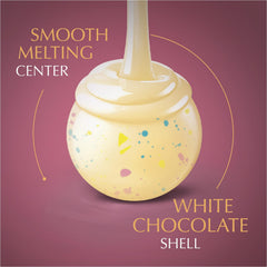 Lindt LINDOR Birthday Cake shell close-up, smooth white chocolate texture.