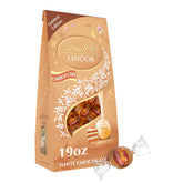 Lindt LINDOR Carrot Cake truffles in a 19 oz bag, ideal for sharing.